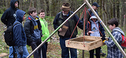 Chapter meber helps scouts at
         Camp Tuscazoar archaeology day